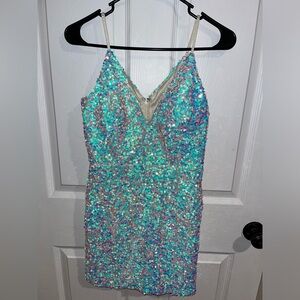 White/silver sequin mini dress.